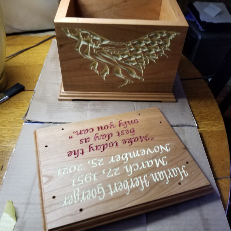 Custom wooden memorial box with a CNC-engraved eagle design and hand-finished text commemorating Harlan Herbert Goerger