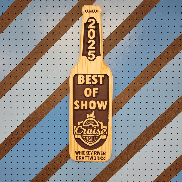 Custom CNC-carved wooden paddle plaque featuring '2025 Best of Show' text and a graphic emblem for a car cruise event