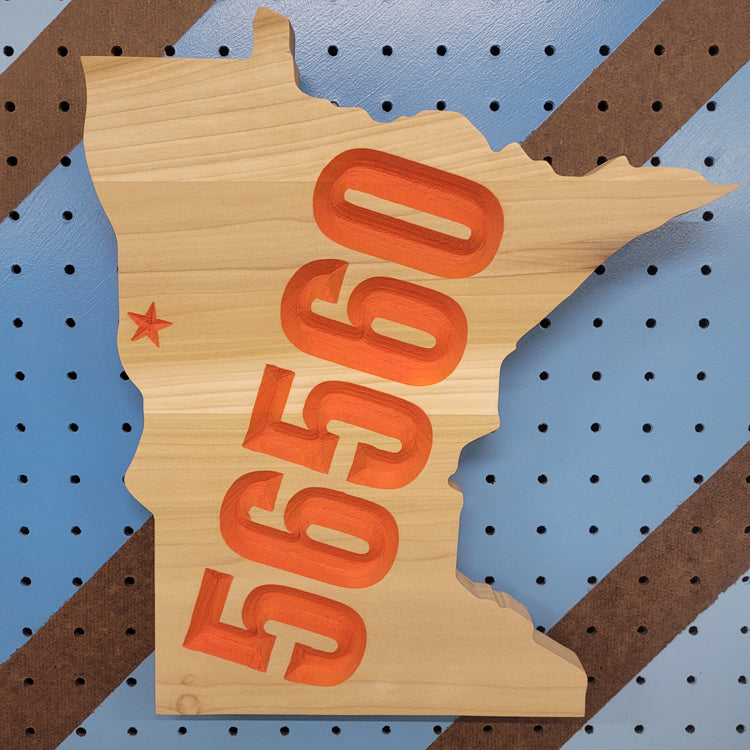 Handcrafted relief-carved hardwood Minnesota sign featuring a customizable town name and zip code, allowing you to highlight your hometown with a personalized star placement.