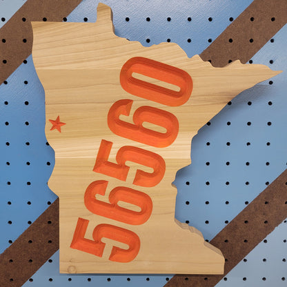 Handcrafted relief-carved hardwood Minnesota sign featuring a customizable town name and zip code, allowing you to highlight your hometown with a personalized star placement.
