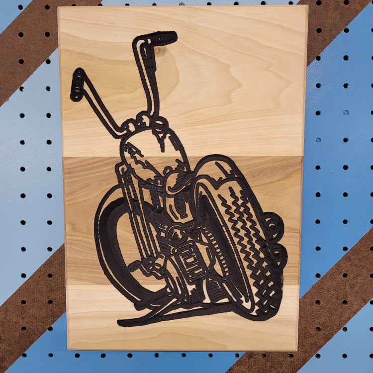 Relief carved hardwood sign featuring a detailed chopper motorcycle resting on its kickstand.