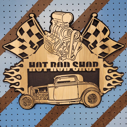 Relief carved hardwood sign with a 1932 Ford hot rod, black blower engine, checkered flags, and Hot Rod Shop text on striped pegboard