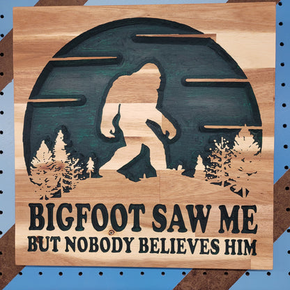 Handcrafted relief-carved hardwood sign featuring a Bigfoot silhouette and the text "BIGFOOT SAW ME BUT NOBODY BELIEVES HIM."