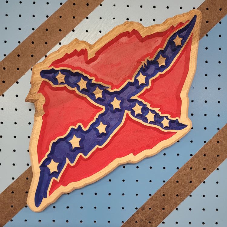 Custom CNC-carved wooden wall art in the shape of a state, featuring a red and blue design with star accents.