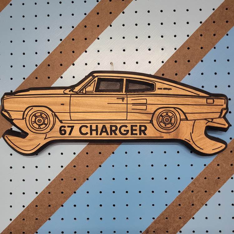 Custom CNC-carved wooden sign shaped like a large wrench, featuring a vintage muscle car silhouette and the text '67'