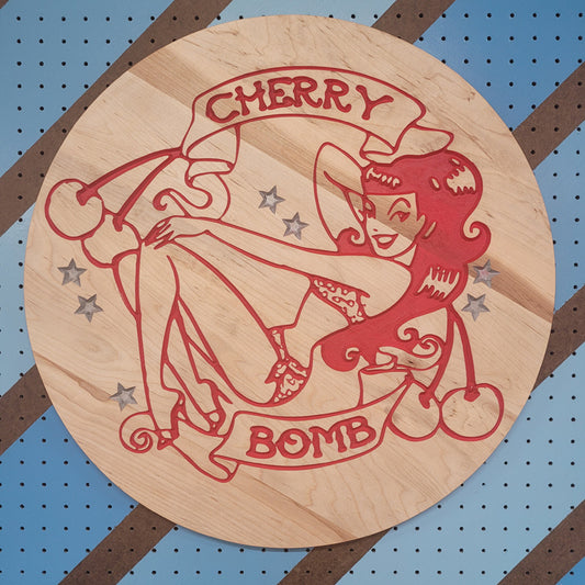 Handcrafted relief-carved hardwood sign featuring a retro "Cherry Bomb" pinup design.
