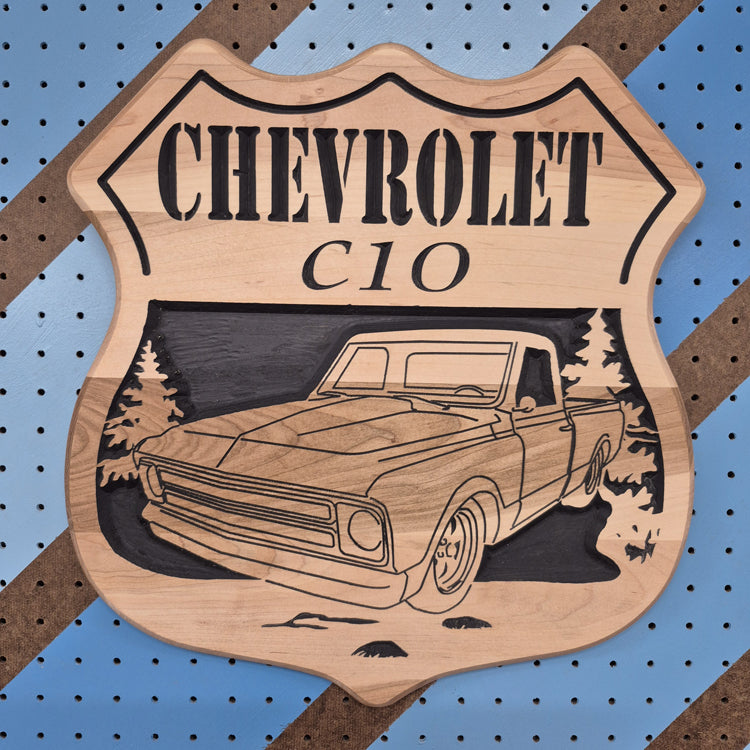 Custom CNC-carved wooden sign featuring a vintage pickup truck illustration, handcrafted and finished by Whiskey River Craftworks