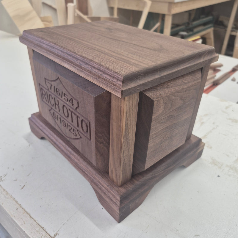 Custom walnut memorial box featuring CNC-engraved name and dates, handcrafted and finished by Whiskey River Craftworks.