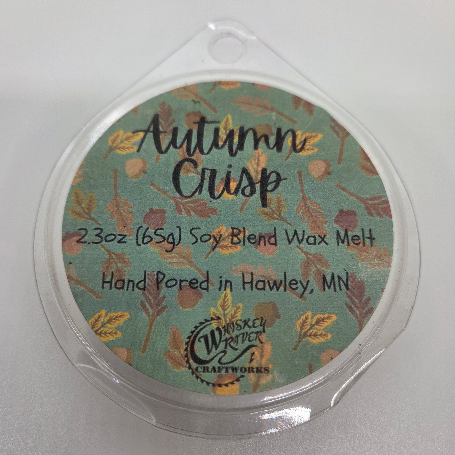 Wax Melts variant in Autumn Crisp featuring a rustic, fall-themed custom fragrance label on a clear clamshell pack.