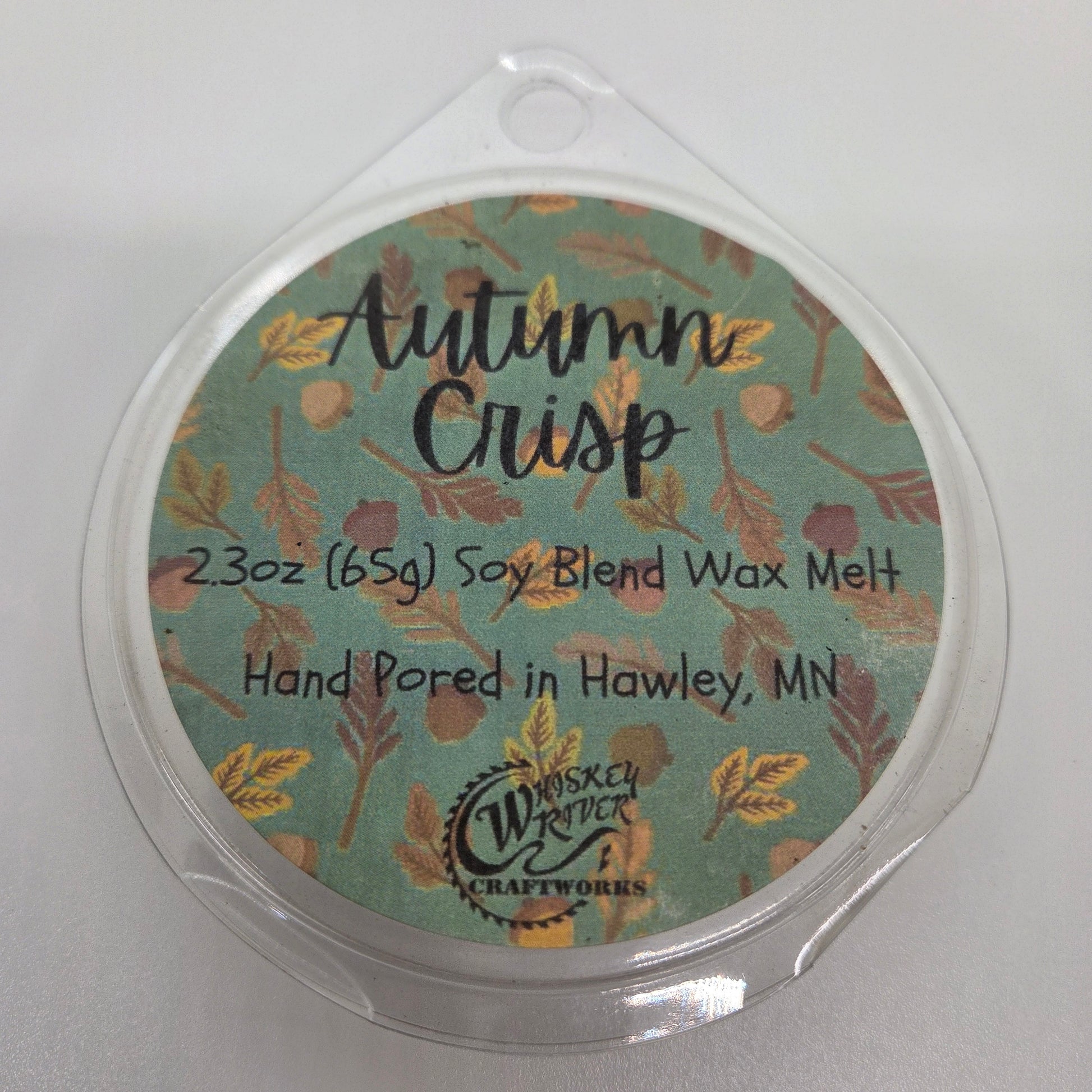 Wax Melts variant in Autumn Crisp featuring a rustic, fall-themed custom fragrance label on a clear clamshell pack.