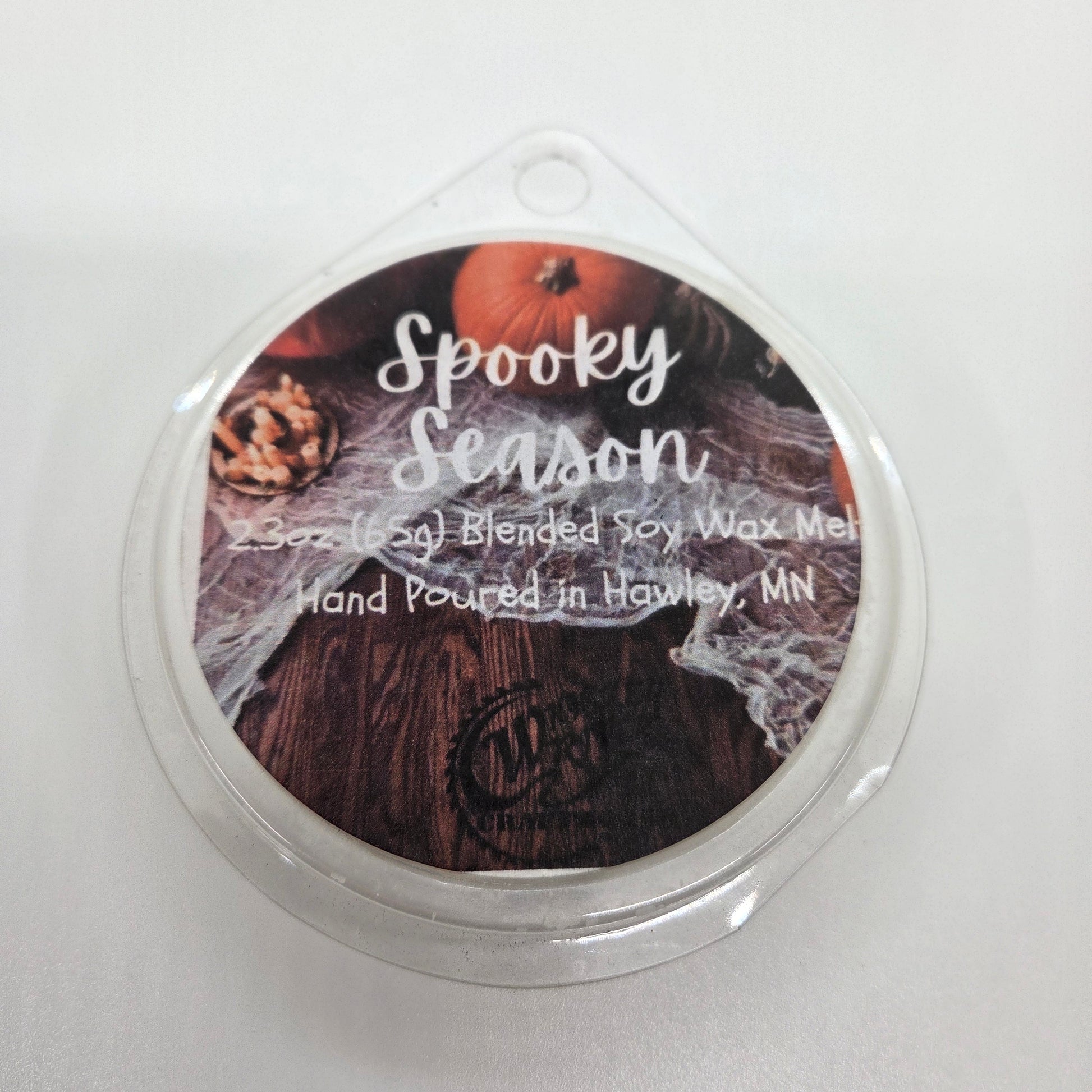 Wax Melts variant in Spooky Season featuring a custom dark, autumn-themed retro fragrance label on a clear clamshell pack.