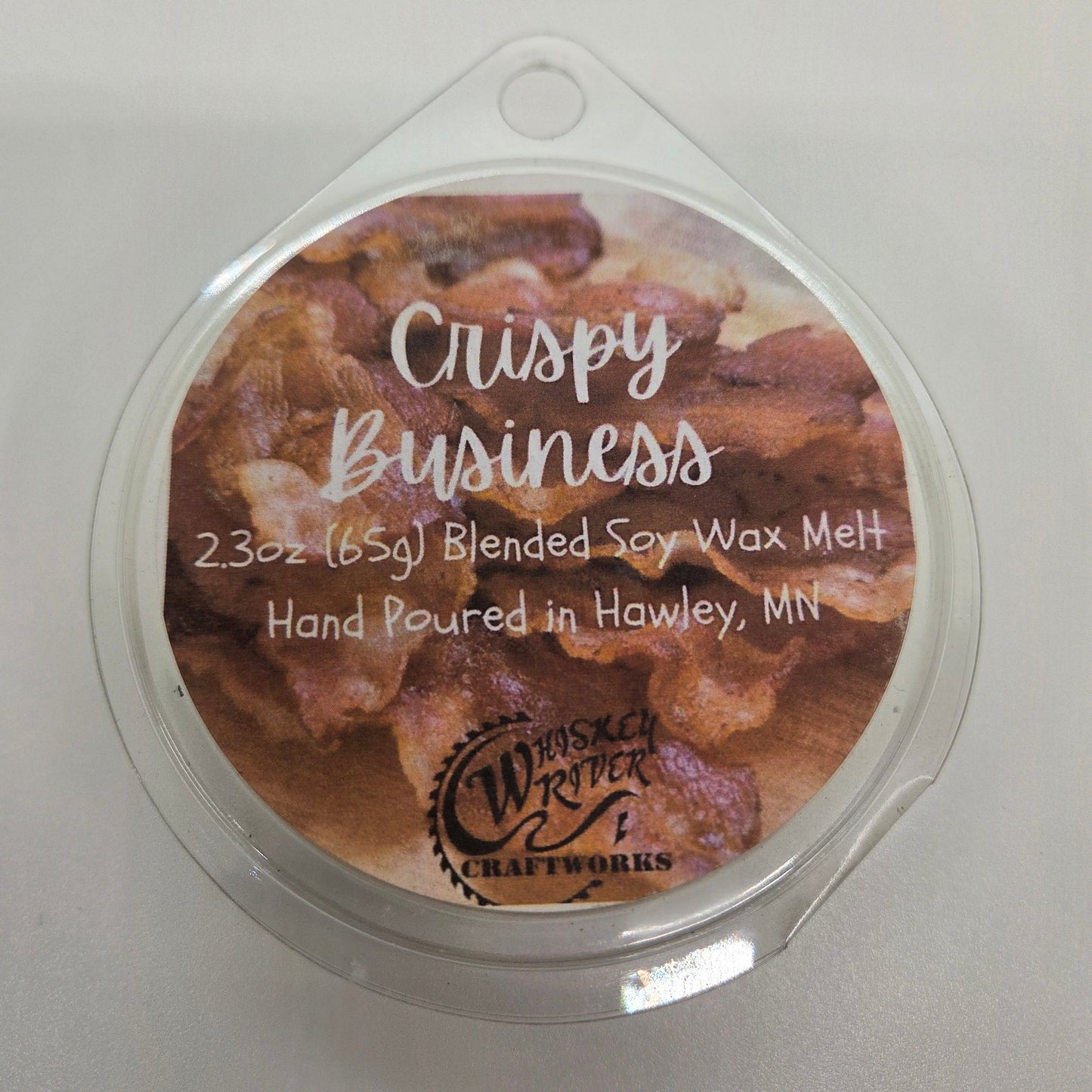 Wax Melts variant in Crispy Business featuring a textured, tongue-in-cheek custom fragrance label on a clear clamshell pack.