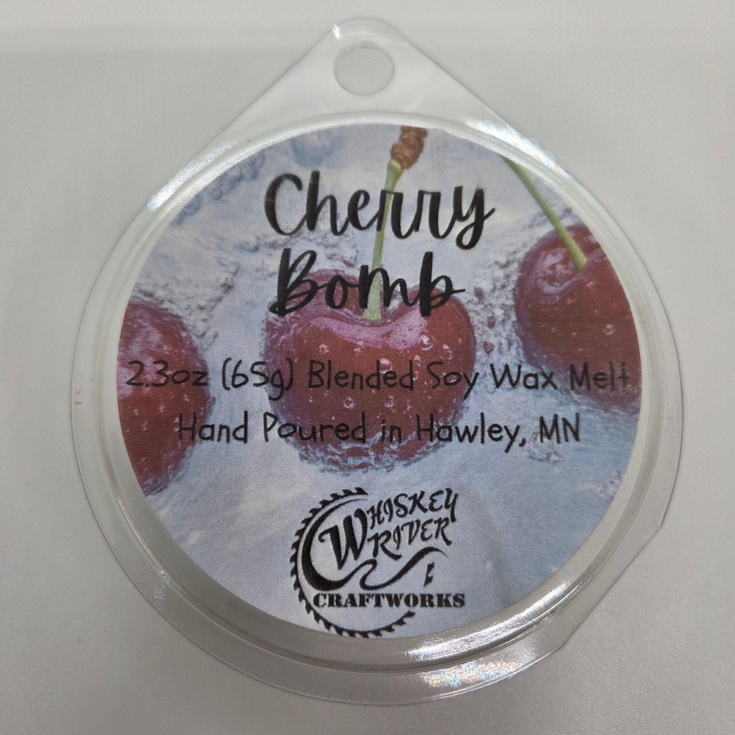 Wax Melts variant in Cherry Bomb featuring a bold, retro-pop style custom fragrance label on a clear clamshell pack.
