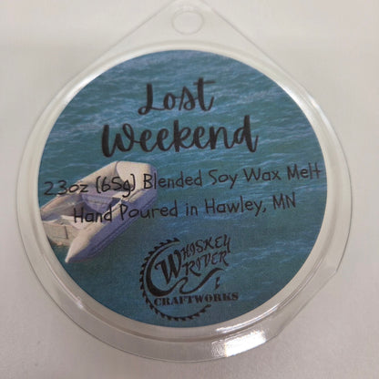 Wax Melts variant in Lost Weekend featuring a moody, atmospheric custom fragrance label on a clear clamshell pack.