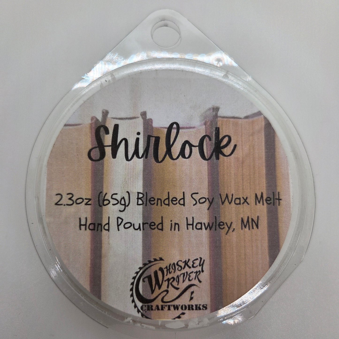 Wax Melts variant in Shurlock featuring a vintage leather book spine style custom fragrance label on a clear clamshell pack.