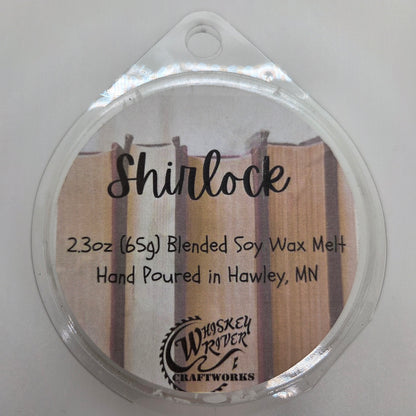 Wax Melts variant in Shurlock featuring a vintage leather book spine style custom fragrance label on a clear clamshell pack.