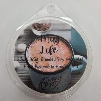 ax Melts variant in Mug Life featuring a cozy, coco-themed custom fragrance label on a clear clamshell pack.