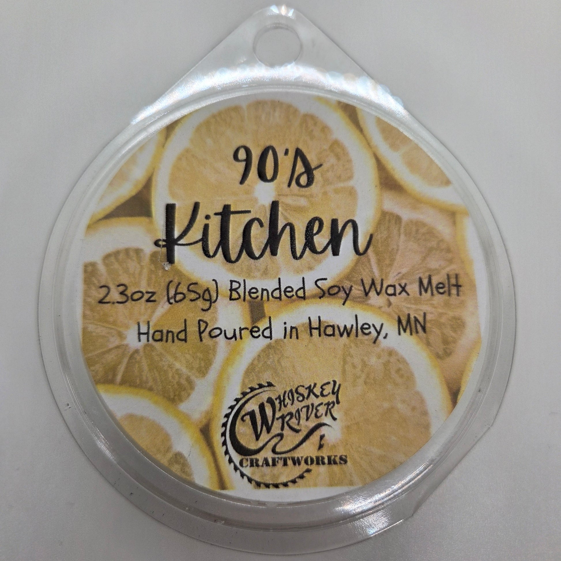 Wax Melts variant in 90'S Kitchen featuring a vibrant, custom lemon themed retro fragrance label on a clear clamshell pack.