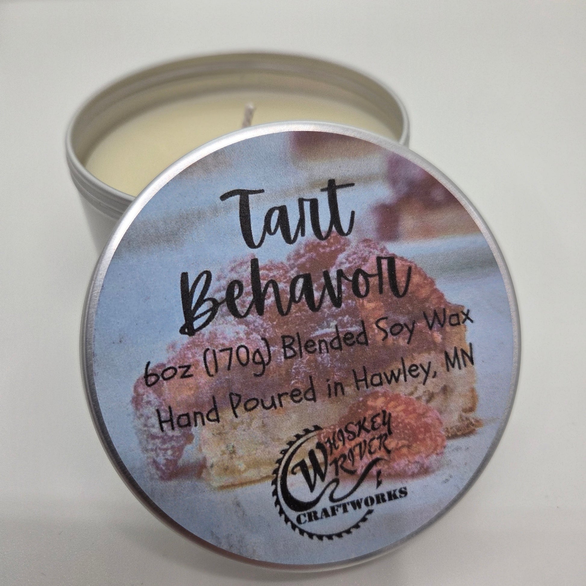 Tart Behavior 6oz Soy Blend Candle featuring a custom retro raspberry custard tart fragrance label on a metal tin lid.
