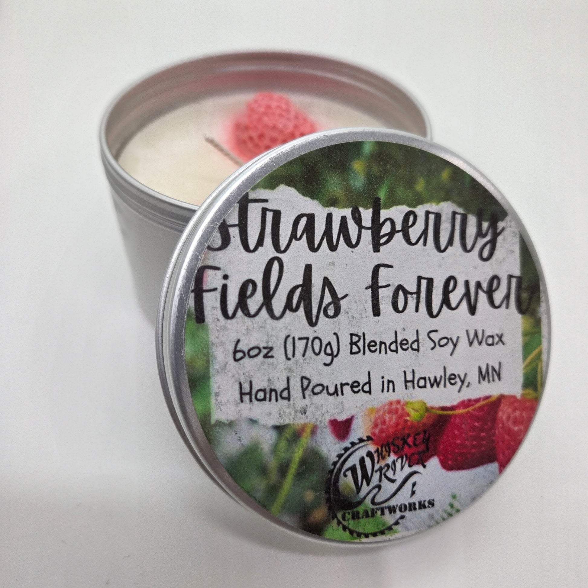 Handcrafted "Strawberry Fields Forever" 6oz soy-blend candle, featuring a sweet, authentic aroma of sun-ripened garden strawberries