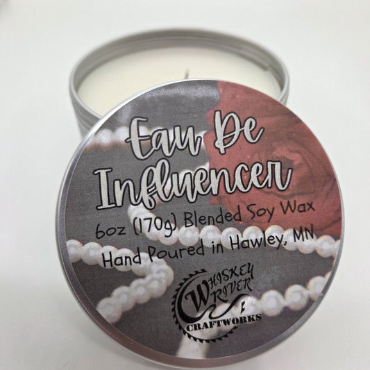 Handcrafted "Eau de Influencer" 6oz soy-blend candle, featuring a luxurious, Baccarat Rouge 540-inspired scent with warm amber, sweet saffron, airy jasmine, and a soft woodsy finish.