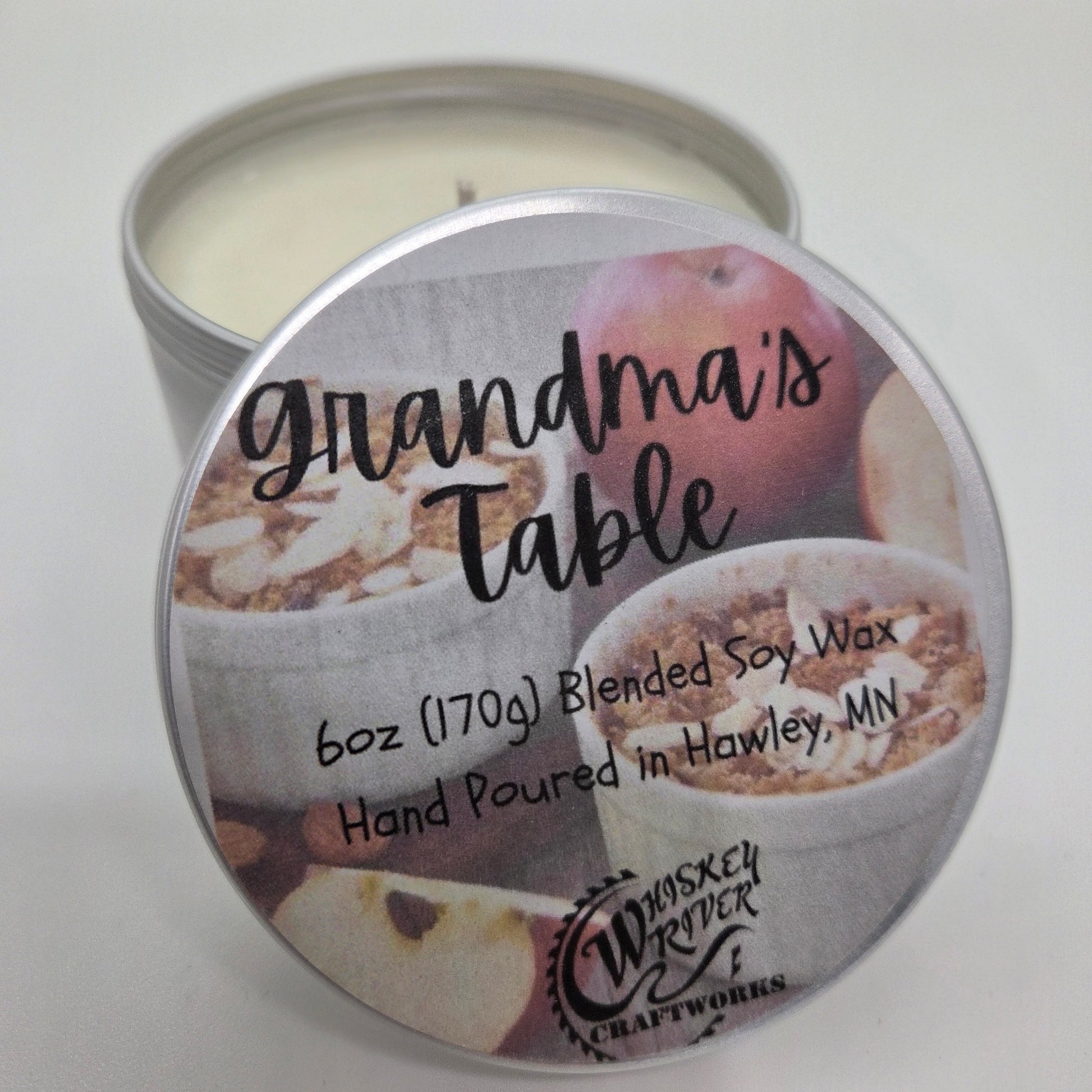 Handcrafted "Grandma's Table" 6oz soy-blend candle, featuring a nostalgic, heartwarming apple maple crumble scent that captures the essence of a warm, homemade Sunday dessert.