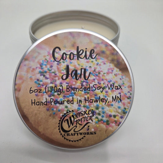 Handcrafted "Cookie Jar" 6oz soy-blend candle, featuring a nostalgic, buttery sugar cookie scent with notes of warm vanilla and sweet baked dough—the perfect way to get that bakery-fresh experience without any of the calories