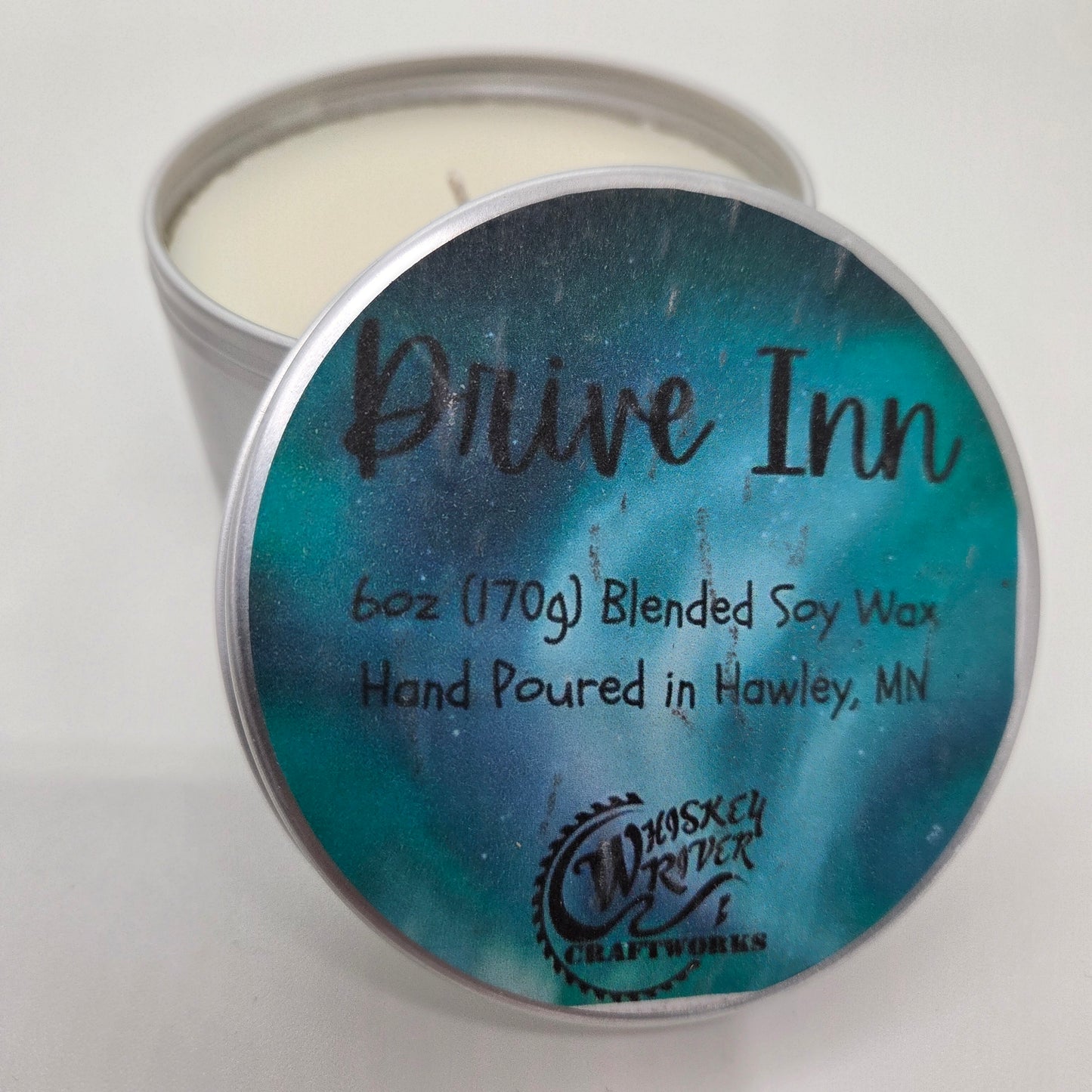 Handcrafted "Drive Inn" 6oz soy-blend candle, featuring a celestial, atmospheric scent profile with notes of cool ozone, dewy florals, smoky vanilla musk, and star-kissed woods.