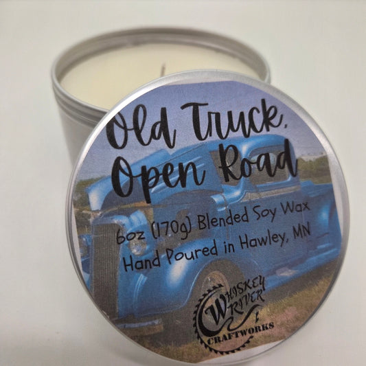 Handcrafted "Old Truck, Open Road" 6oz soy-blend candle, featuring a rugged, masculine blend of aged leather, patchouli, rosewood, and a hint of bergamot for an adventurous, open-highway scent.