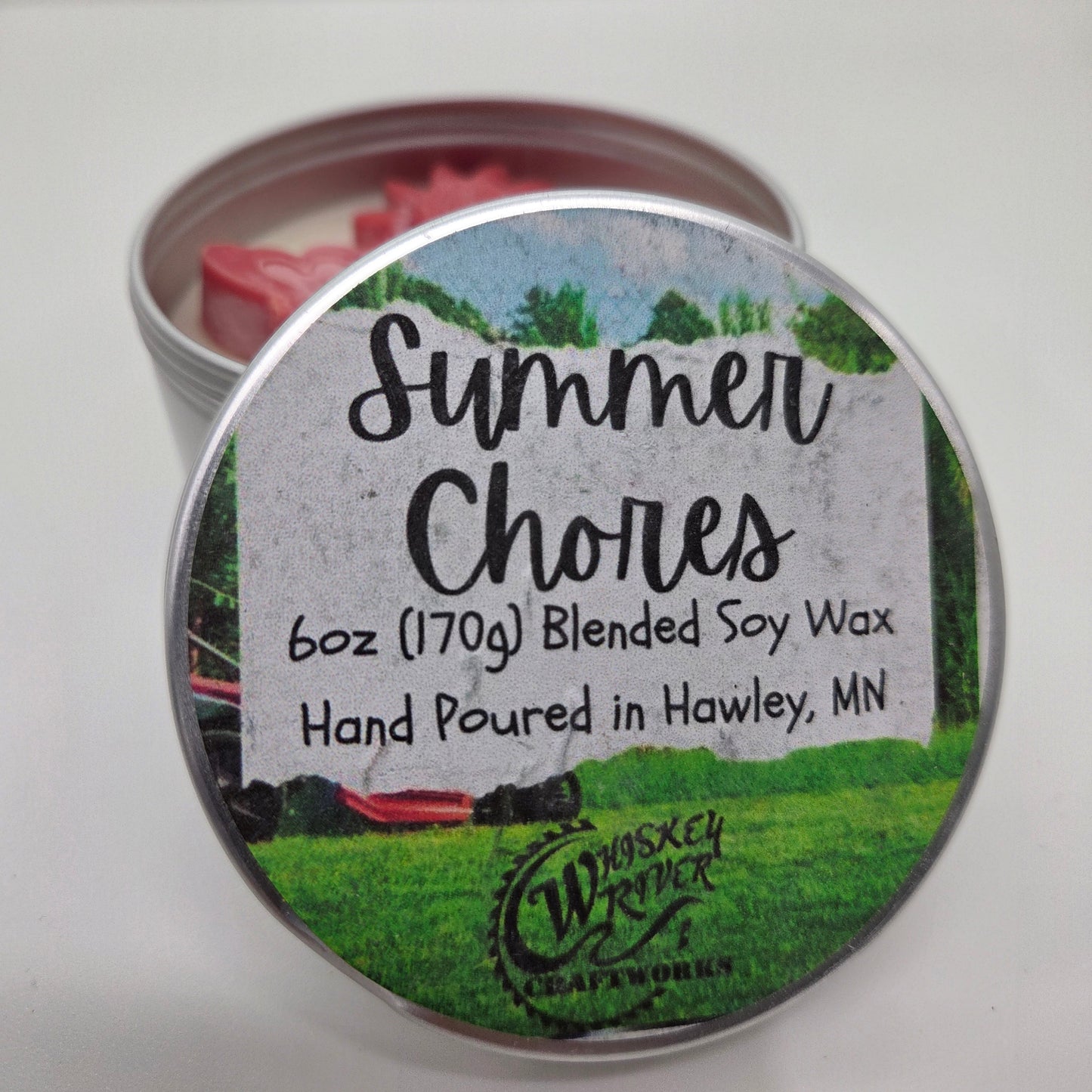 Handcrafted "Summer Chores" 6oz soy-blend candle, featuring a fresh, Pacific Northwest-inspired scent profile of freshly cut grass, pine, and cool mountain air.