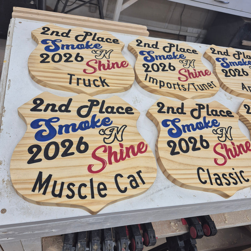 Custom CNC-carved wooden award plaques featuring '2nd Place Smoke Shine' and 'Muscle Car Classic' text, handcrafted and finished by Whiskey River Craftworks.