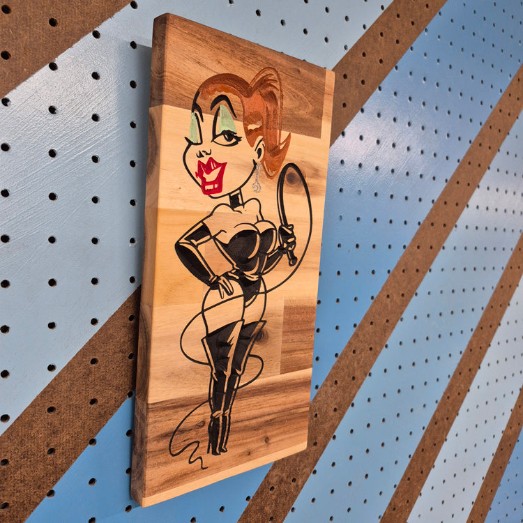 Edgy Dominatrix wooden wall sign displayed as home bar and garage man cave decor.