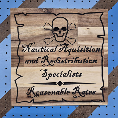 A vertical solid hardwood carved sign featuring a pirate skull and crossbones design. The text reads "Nautical Acquisition and Redistribution Specialists" and "Reasonable Rates" in a classic, rustic font.