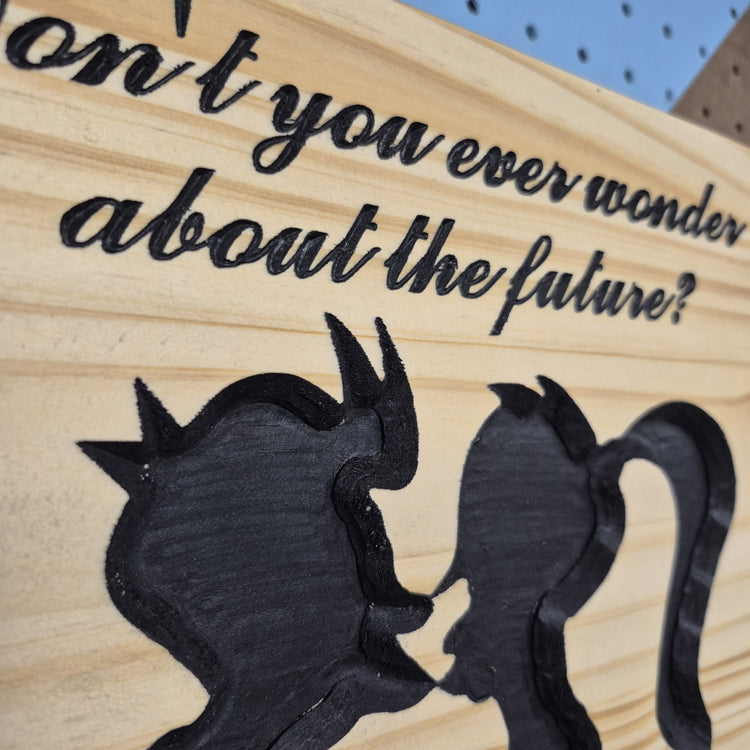 A tight close-up shot focusing on the character silhouettes and hand-painted text, highlighting the incredibly crisp CNC carving lines, the smooth wood textures, and the precise black paint filling the background cuts.