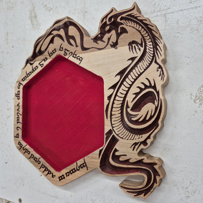 A perspective view from the opposite angle of the carved hexagonal tray, showcasing the smooth outer rim and the seamless transition to the red flocked interior rolling surface.