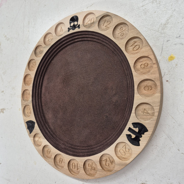 An angled side perspective of the circular Gladiator wooden dice tray, showcasing the clean depth of the flat CNC relief cuts and the rich patterns of the natural hardwood grain.