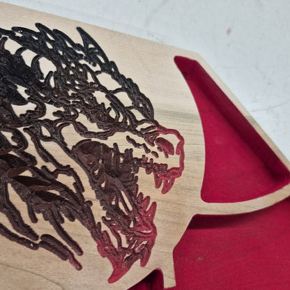 A tight close-up shot focusing on the roaring dragon head carving on the tray's border, highlighting the incredibly crisp CNC machining and the detailed multi-color paint scheme on the scales and horns.