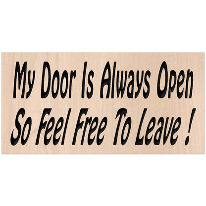 Relief carved hardwood sign featuring the text: My Door Is Always Open So Feel Free To Leave!