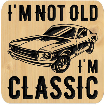 Relief carved hardwood sign with a classic car design and I'm Not Old, I'm Classic text on a white background.