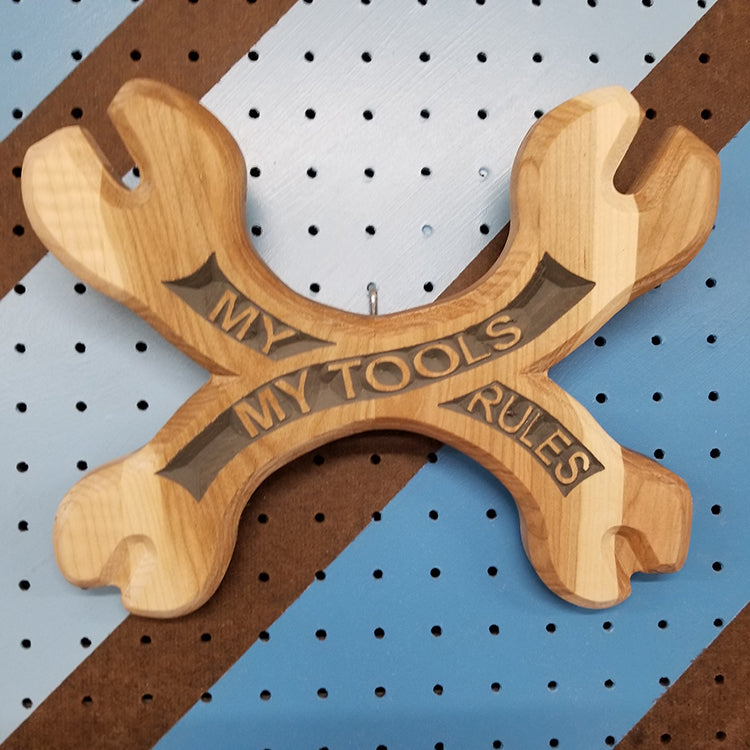 Handcrafted relief-carved hardwood sign in the shape of crossed wrenches, featuring the text "My Tools My Rules.