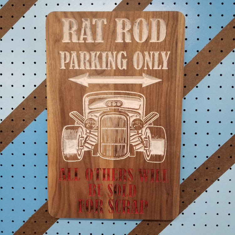 Personalized rat rod parking wood sign displayed as custom garage and workshop wall decor.